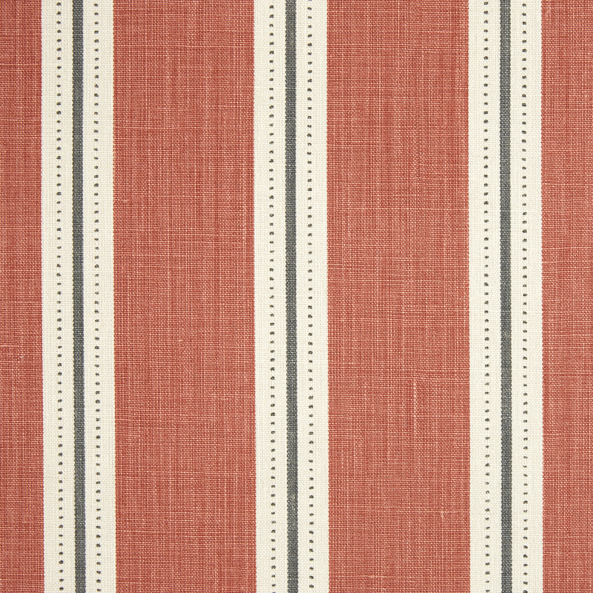 Detail of fabric in a repeating stripe print in white and gray on a burnt orange field.