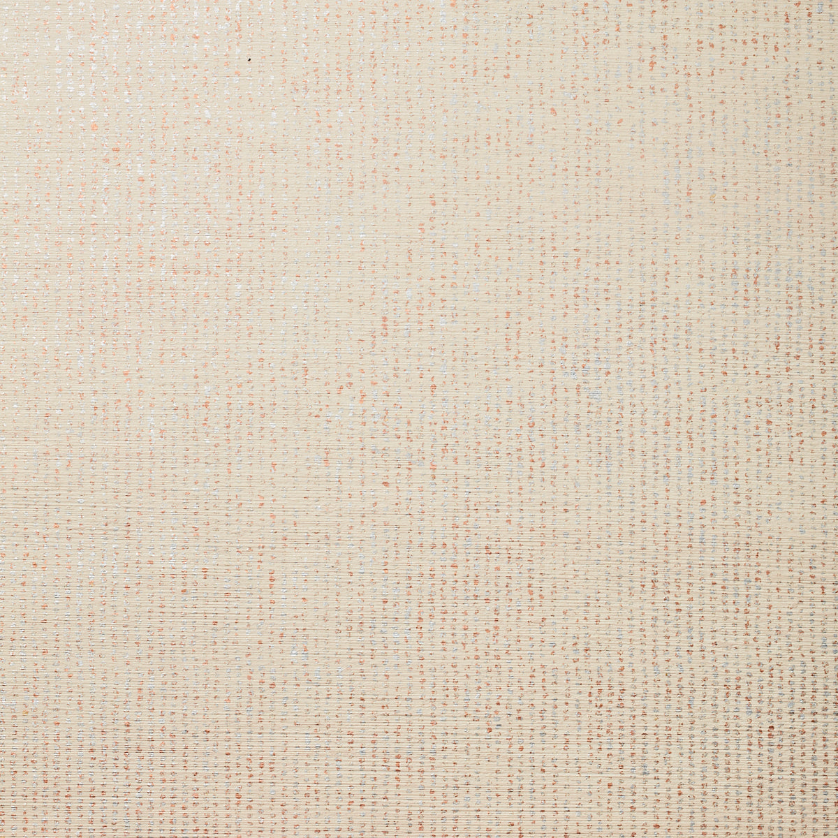 Detail of wallpaper in a paint splatter print in gold on a cream field.