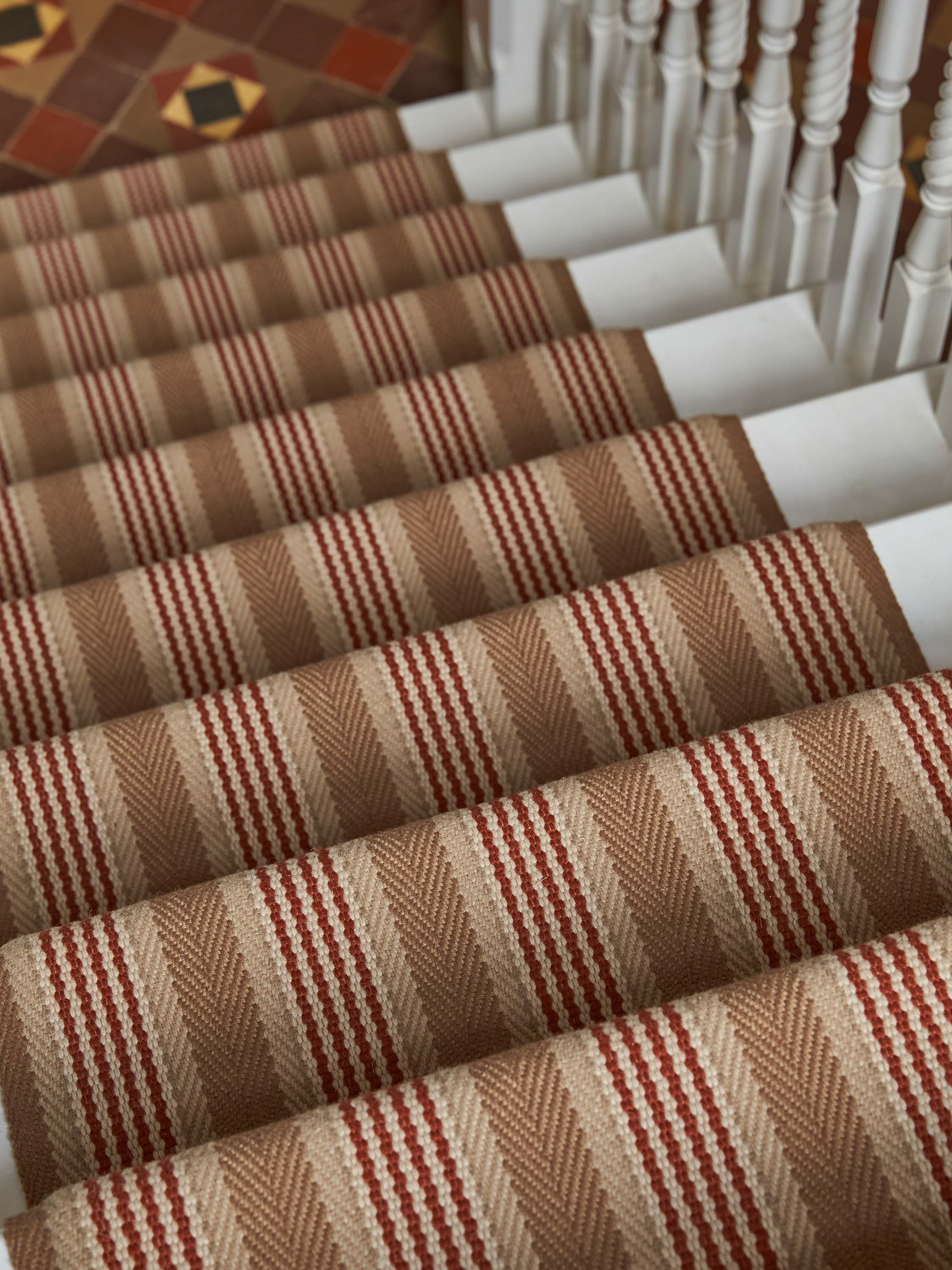 Striped flatweave runner in tan and red