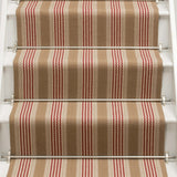 Striped flatweave runner in tan and red on white staircase