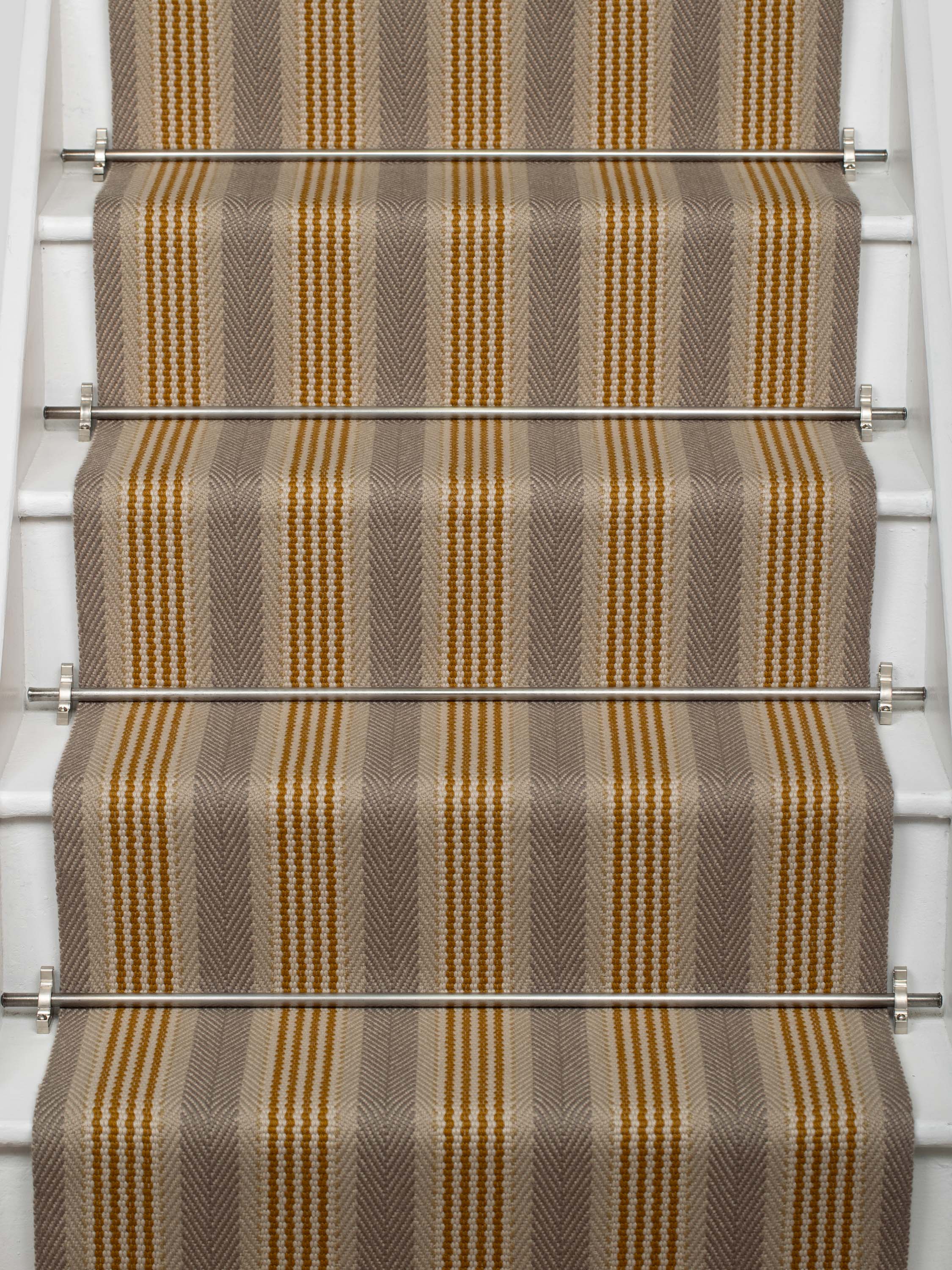 Striped flatweave runner in tan grey black on white staircase