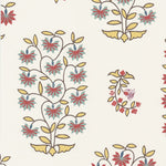 Detail of wallpaper in a small-scale floral print in shades of yellow, red, turquoise and brown on a white field.