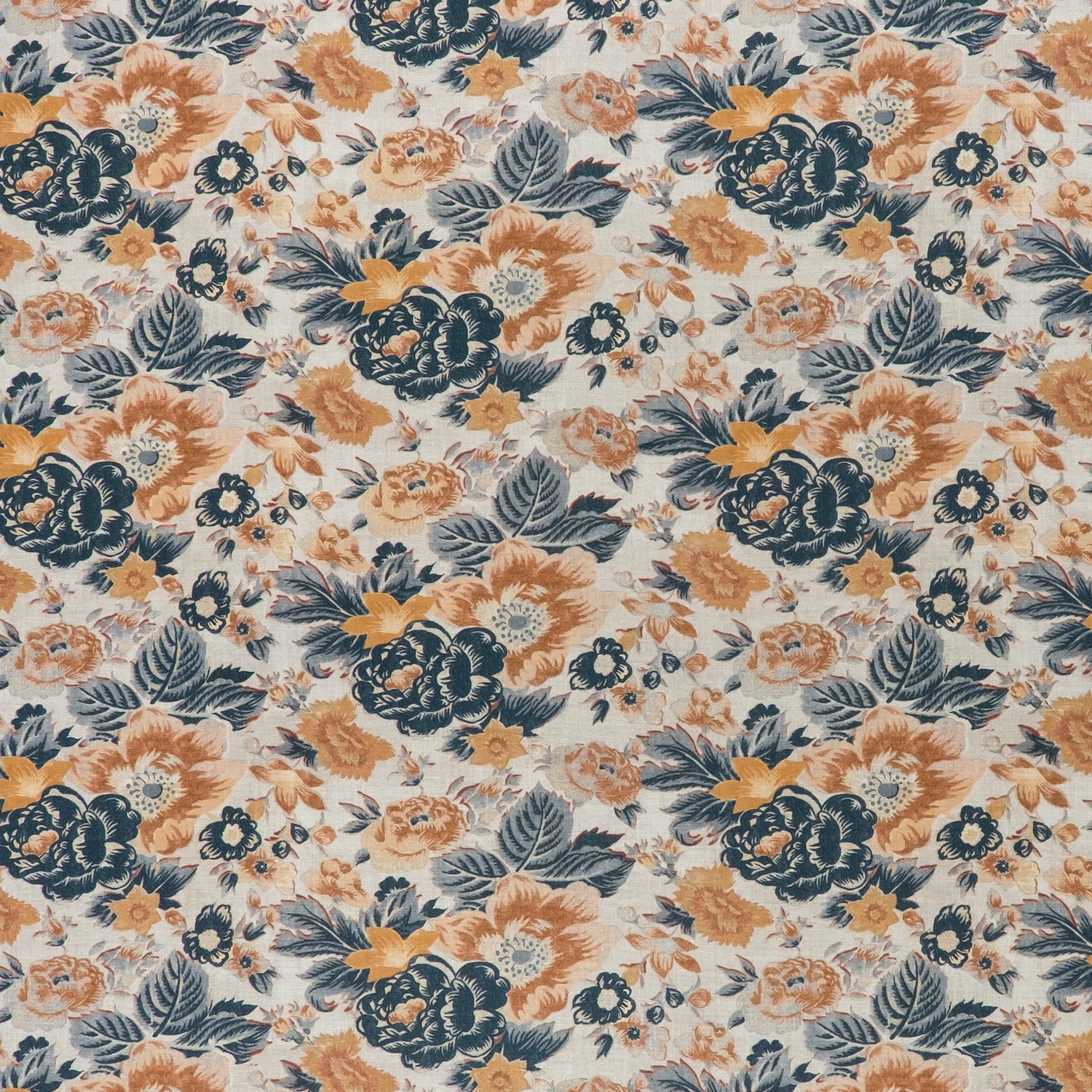 printed linen fabric in a detailed floral pattern in shades of blue and orange on a cream field.