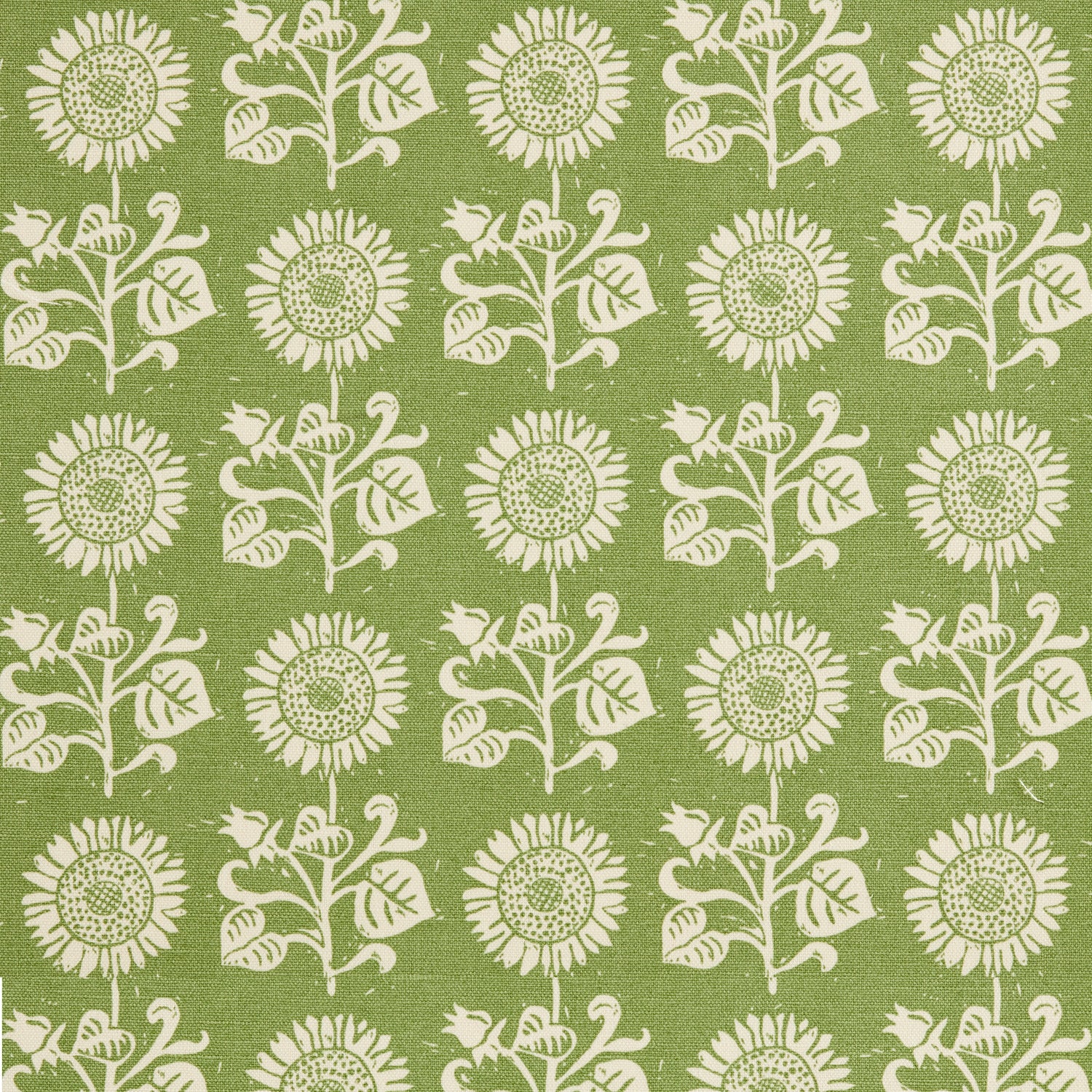 Detail of fabric in a repeating sunflower print in white on an olive field.