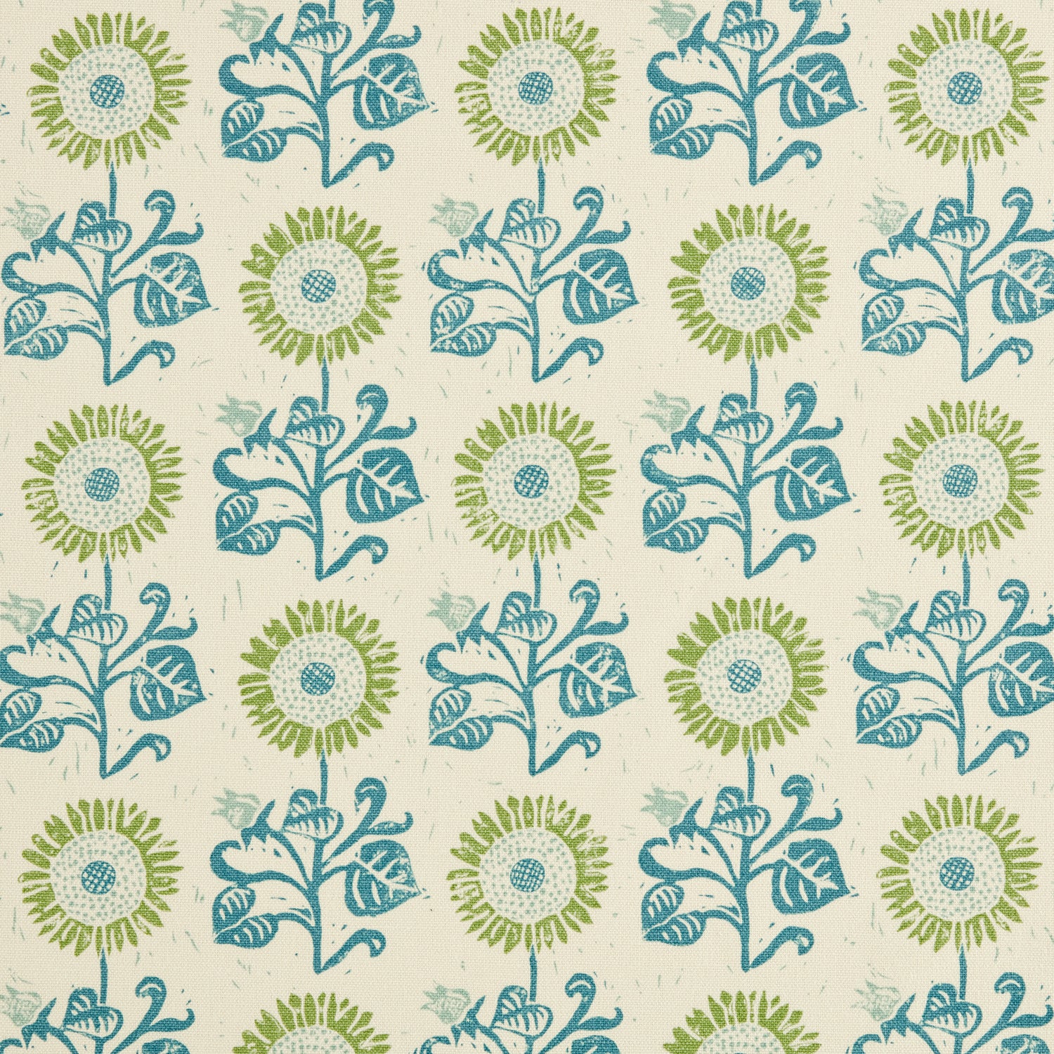 Detail of fabric in a repeating sunflower print in olive and blue on a cream field.