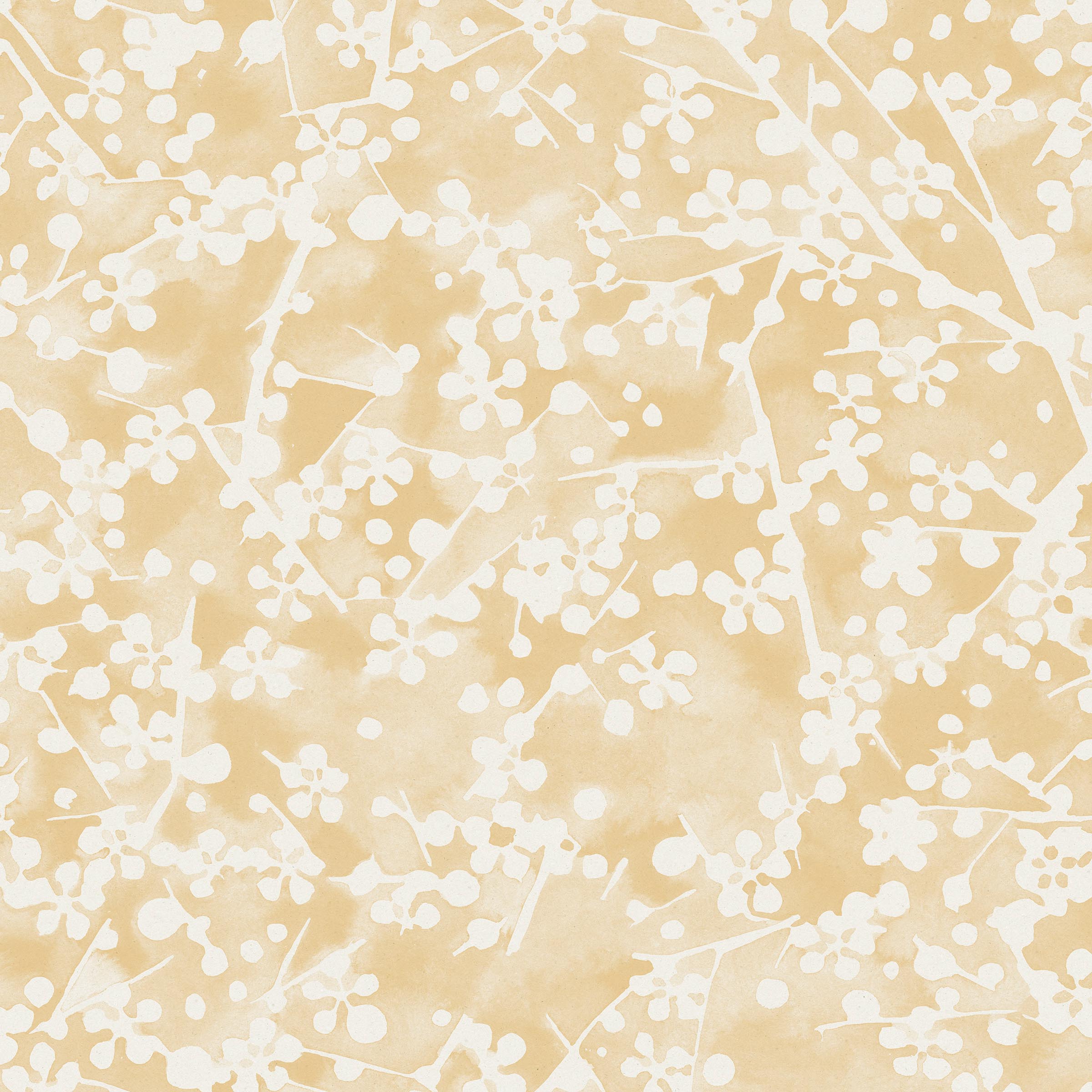 Detail of fabric in a painterly branch print in white on a yellow watercolor field.