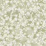 Detail of wallpaper in a painterly branch print in white on a light green watercolor field.