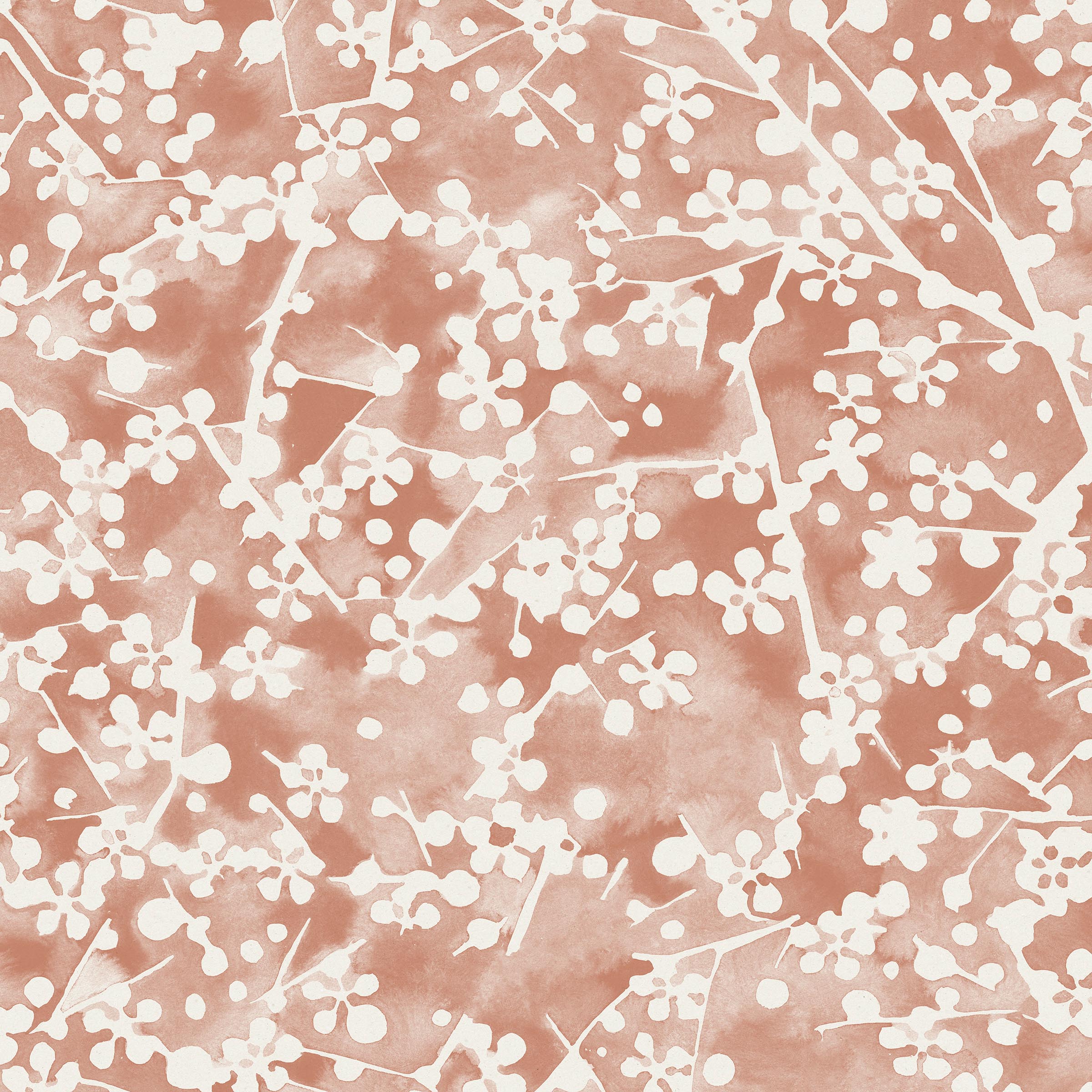 Detail of wallpaper in a painterly branch print in white on a coral watercolor field.