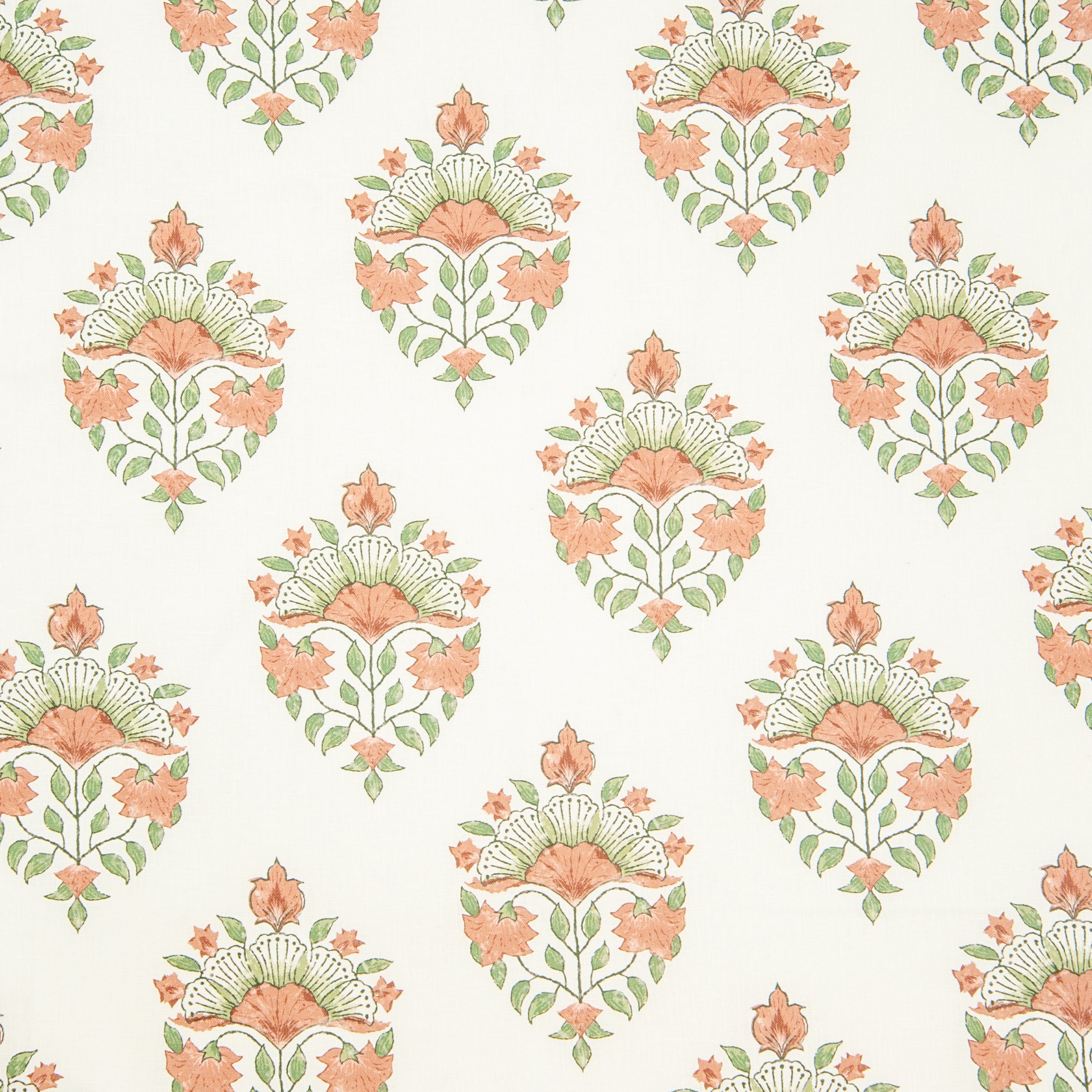 Detail of fabric in a floral paisley print in shades of green and coral on a white field.