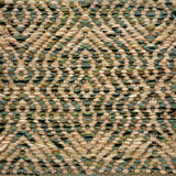 Textured handwoven rug with a diamond pattern in tan and green.