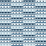 Detail of wallpaper in a playful geometric grid print in shades of blue, navy and white.