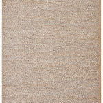 Beige area rug with a textured pattern on a white background