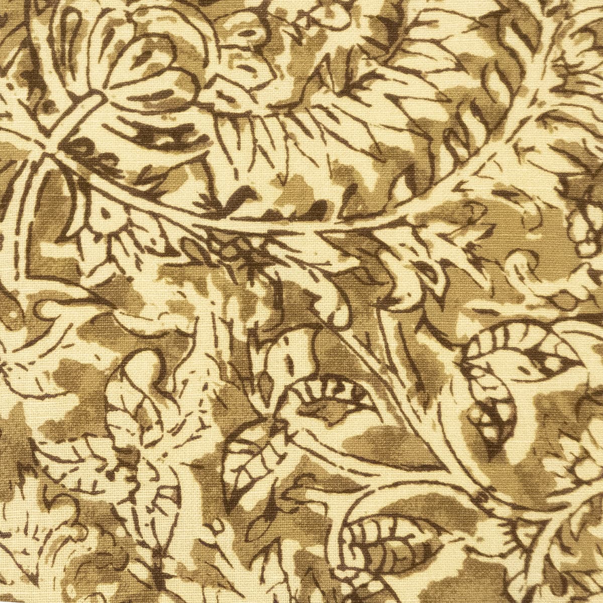 Detail of fabric in a floral paisley print shades of brown on a cream field.