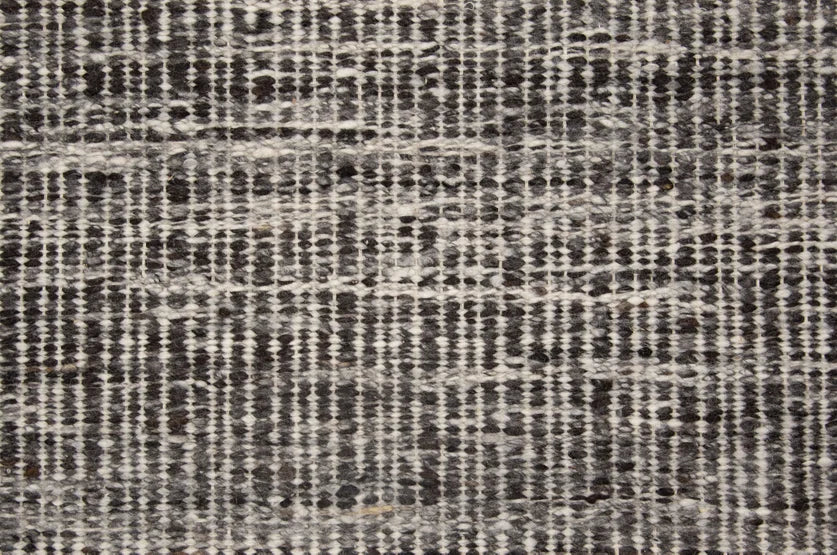 Broadloom carpet swatch in a stripe pattern in a dark grey design