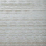 Detail of wallpaper in a wavy stripe print in metallic gray.