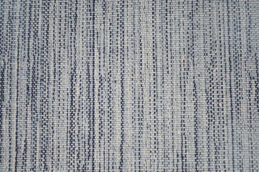 Broadloom carpet swatch in a stripe pattern in a light blue design