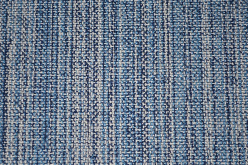 Broadloom carpet swatch in a stripe pattern in a blue design