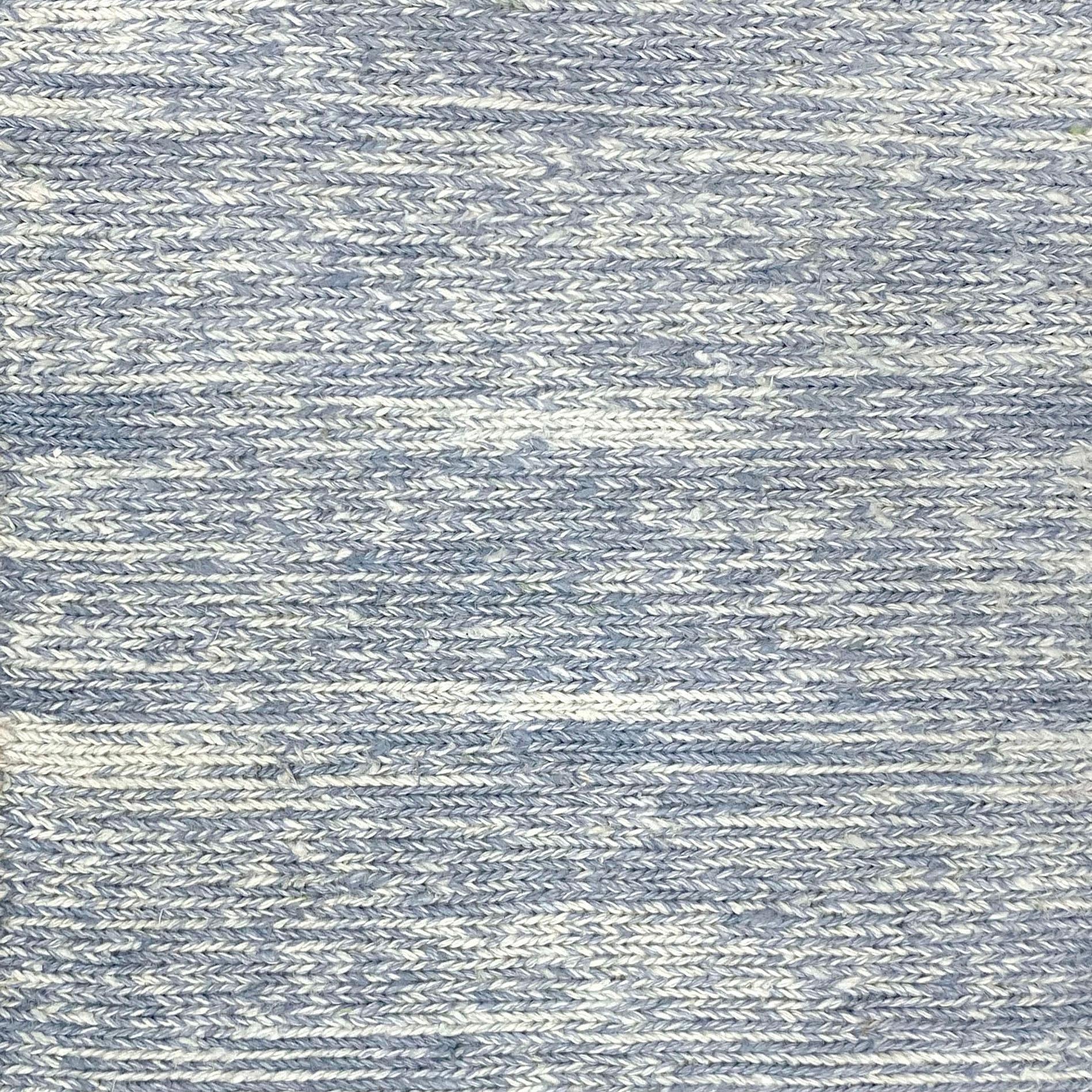 Broadloom carpet swatch solid design in striated light blue