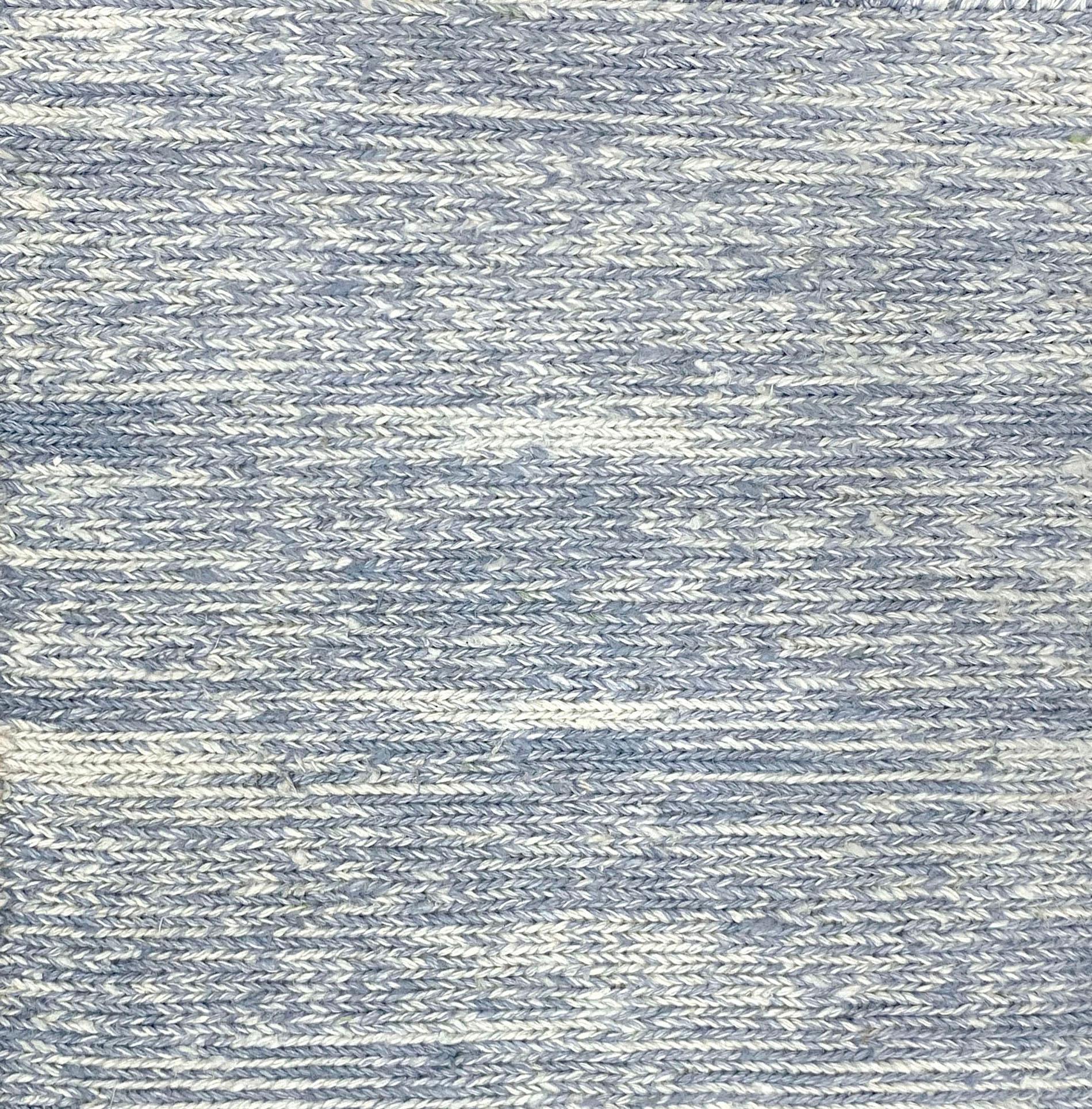 Broadloom carpet swatch solid design in striated light blue