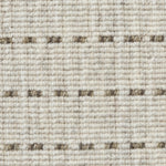 Broadloom carpet detail in a oatmeal field with a brown dotted stripe.