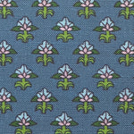 Patterned fabric with floral design on a blue background