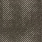 printed linen fabric in a clustered dot pattern in beige on a dark gray field.