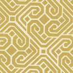 Detail of fabric in a geometric lattice print in gold on a cream field.