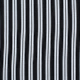 Striped performance fabric in white on black.