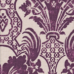 Detail of fabric in a damask vase print in purple on a cream field.