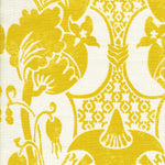 Detail of fabric in a damask vase print in yellow on a white field.