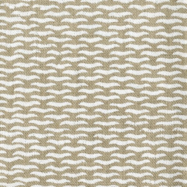 Fabric in a repeating abstract print in cream on a tan field.