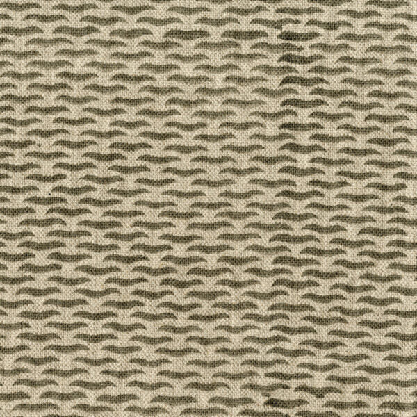 Fabric in a repeating abstract print in brown on a tan field.