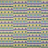 Detail of fabric in a playful geometric grid print in shades of purple, yellow and green.