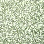 Detail of fabric in a dense paisley print in white on a green field.