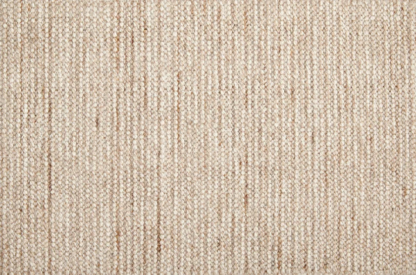 Broadloom carpet swatch in a textured pattern in a tan design