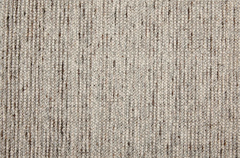 Broadloom carpet swatch in a textured pattern in a grey design