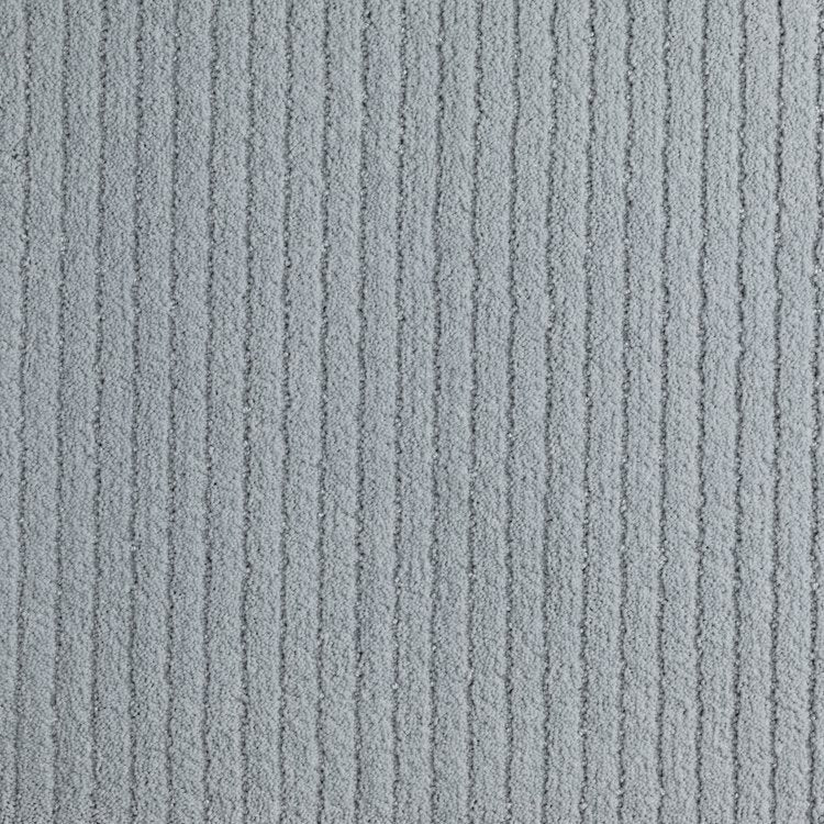 Broadloom carpet in grey, with a textural stripe.