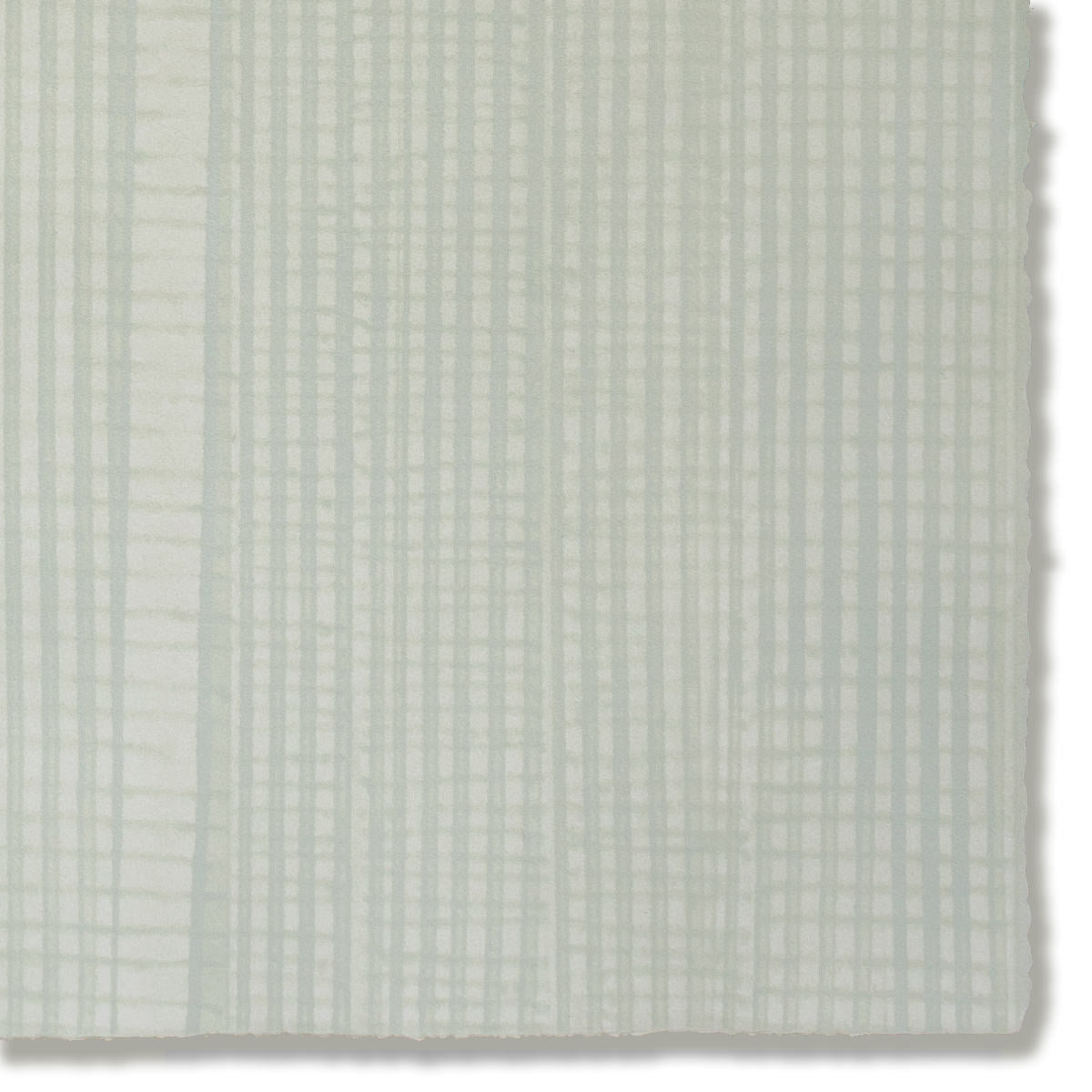 Detail of a hand-painted wallpaper swatch with an irregular grid pattern in sage on a light green field.