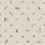 Detail of wallpaper in a playful animal and branch print in blue on a cream field.