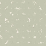 Detail of wallpaper in a playful animal and branch print in white on a sage field.