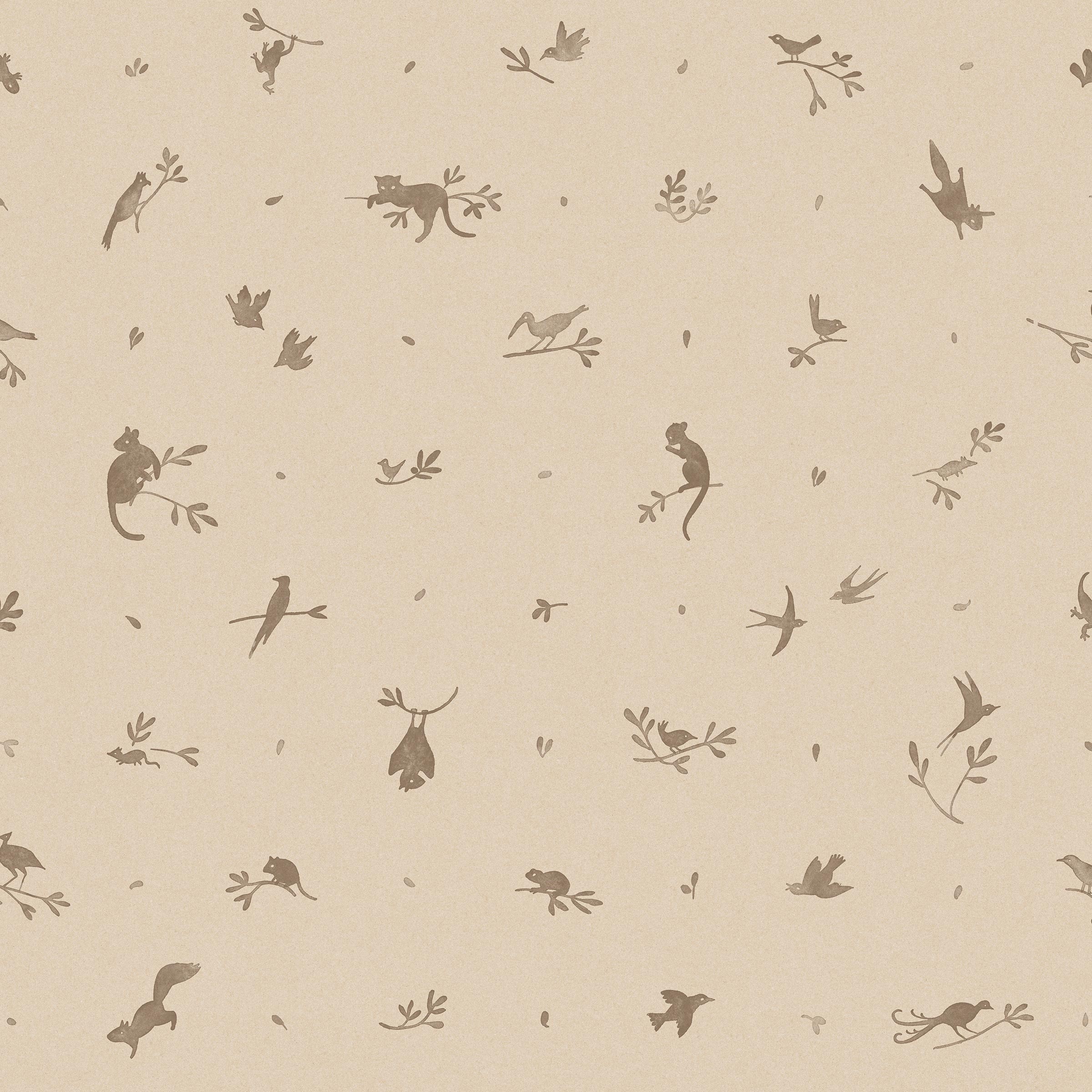 Detail of wallpaper in a playful animal and branch print in brown on a cream field.