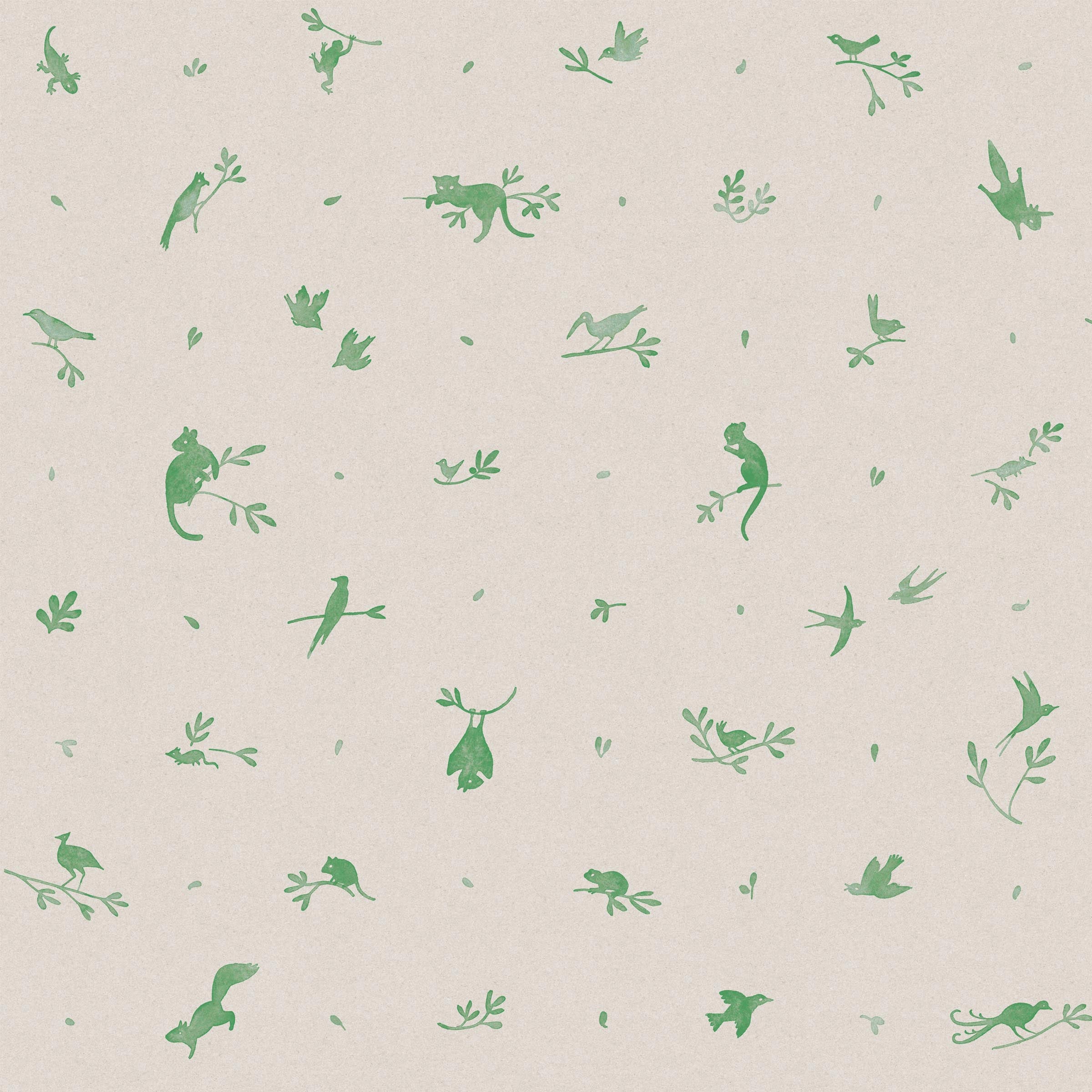 Detail of fabric in a playful animal and branch print in green on a tan field.