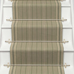 Striped flatweave runner in sage on white staircase 