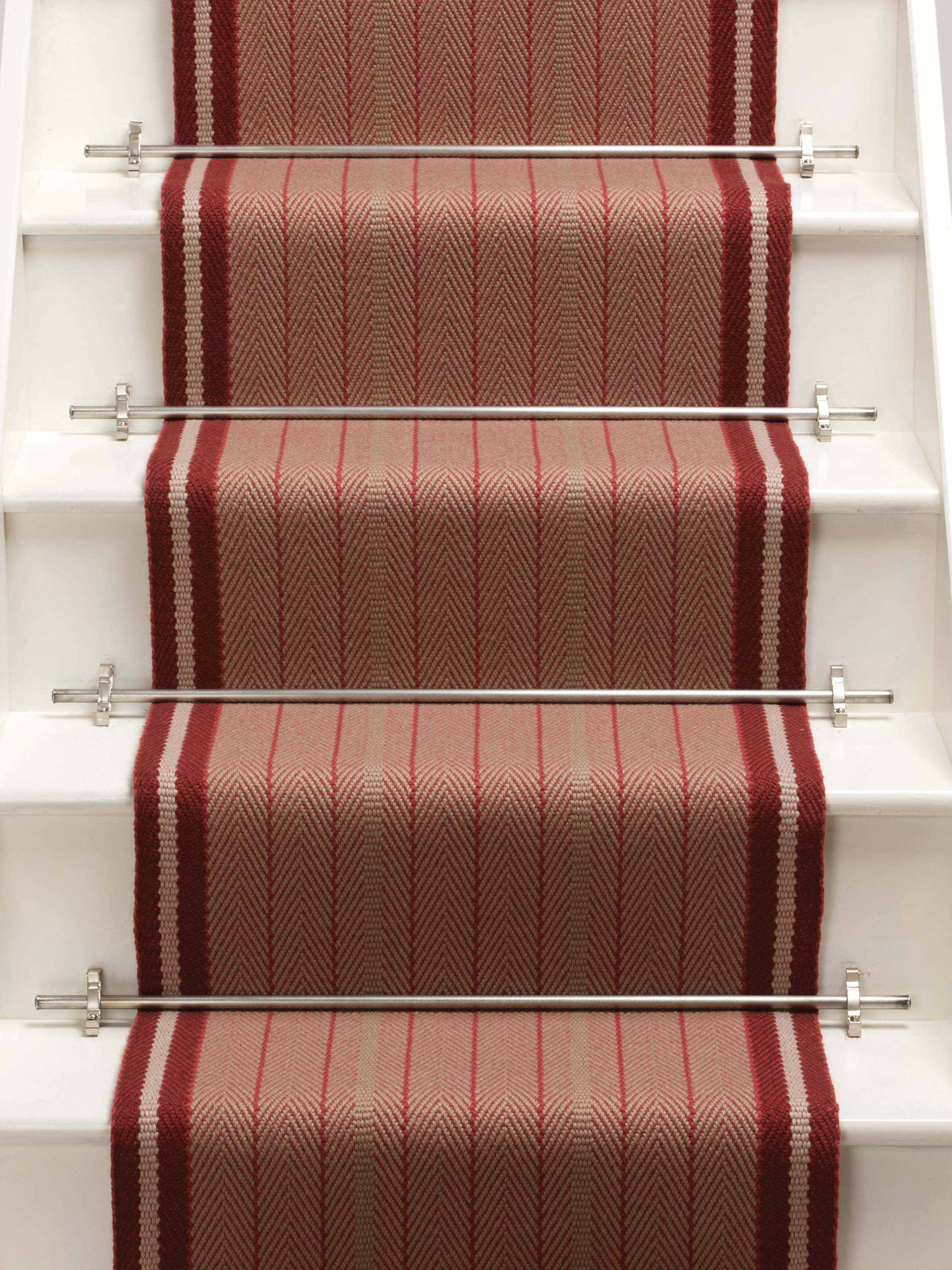 Striped flatweave runner in red on white staircase