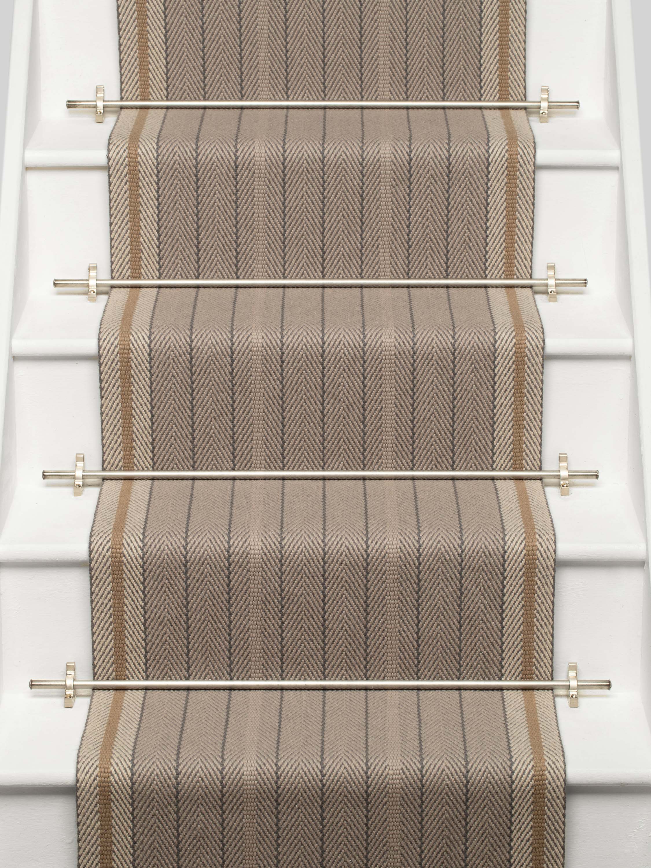 Striped flatweave runner in grey and tan on white staircase 