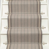 Striped flatweave runner in grey on white staircase