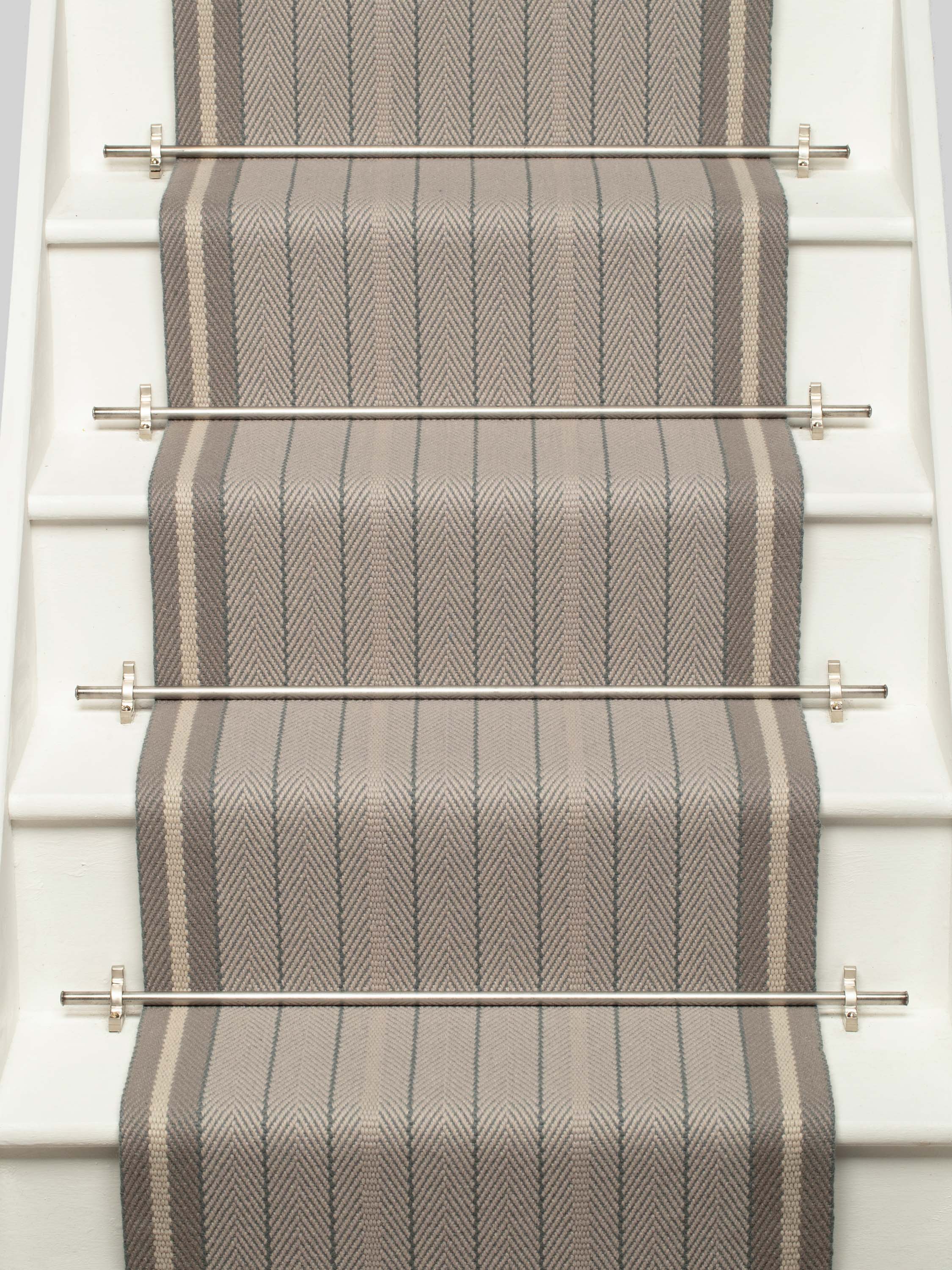 Striped flatweave runner in grey on white staircase