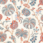 Detail of wallpaper in a floral paisley in shades of red, blue and brown on a white field.