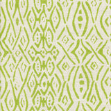 Detail of fabric in a painterly geometric grid in green on a cream field.