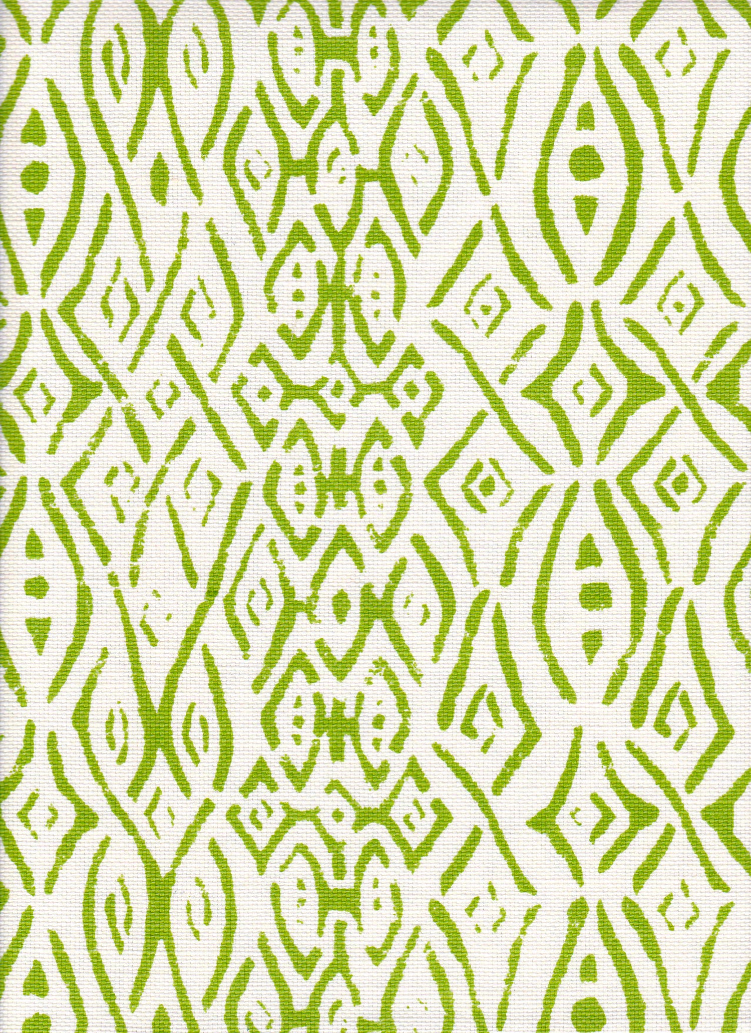 Detail of fabric in a painterly geometric grid in green on a white field.